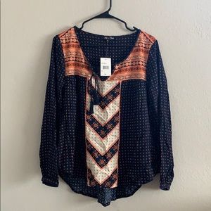Navy blue and orange long-sleeve v neck shirt